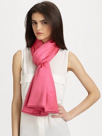 Whimsical ball fringe accented style in a luxurious silk and cashmere blend. 60% silk/40% cashmereAbout 22 X 78Dry cleanImported Whimsical ball fringe accented style in a luxurious silk and cashmere blend. 60% silk/40% cashmereAbout 22 X 78Dry cleanImported