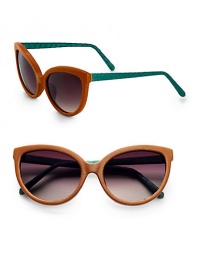 This unique and tactile style features a supple leather, retro-inspired frame with luxurious snakeskin temples. Available in brown leather-green skin with smoke gradient lens. Leather wrapped framesSnakeskin temples100% UV protectionImported This unique and tactile style features a supple leather, retro-inspired frame with luxurious snakeskin temples. Available in brown leather-green skin with smoke gradient lens. Leather wrapped framesSnakeskin temples100% UV protectionImported