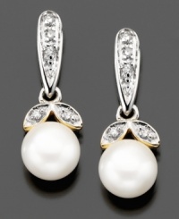 Sunny cultured freshwater pearls (6mm) are nestled between two petals of diamond accents on these beautiful drop earrings crafted in 14k gold and sterling silver. Approximate drop: 1/2 inch. Sunny cultured freshwater pearls (6mm) are nestled between two petals of diamond accents on these beautiful drop earrings crafted in 14k gold and sterling silver. Approximate drop: 1/2 inch.