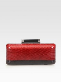 Elegant and chic, this snake embossed leather design features an eye-catching colorblock style.Concealable shoulder strap, 21 dropTop clasp closureOne inside open pocketFully lined8W X 3¼H X 1½DImported Elegant and chic, this snake embossed leather design features an eye-catching colorblock style.Concealable shoulder strap, 21 dropTop clasp closureOne inside open pocketFully lined8W X 3¼H X 1½DImported