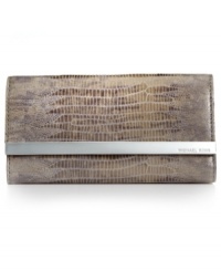 Simple, soft, and completely essential, this luxe leather wallet from MICHAEL Michael Kors stylishly stows all your everyday must-haves. The perfectly aligned interior provides plenty of pockets and compartments while the exterior is accented with sleek silvertone detailing. Simple, soft, and completely essential, this luxe leather wallet from MICHAEL Michael Kors stylishly stows all your everyday must-haves. The perfectly aligned interior provides plenty of pockets and compartments while the exterior is accented with sleek silvertone detailing.