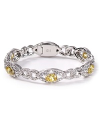 Nadri's striking canary-yellow bracelet is designed to add a flourish to your evening ensembles, featuring dazzling crystals and stones. Nadri's striking canary-yellow bracelet is designed to add a flourish to your evening ensembles, featuring dazzling crystals and stones.