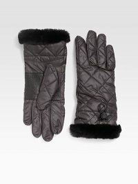 Trimmed in soft shearling, this quilted style mixes function and fashion. Leather palmElastic drawstring cuffDyed sheepskin shearlingFill: polyesterAbout 10½ longSpecialist dry cleanImportedFur origin: Spain Trimmed in soft shearling, this quilted style mixes function and fashion. Leather palmElastic drawstring cuffDyed sheepskin shearlingFill: polyesterAbout 10½ longSpecialist dry cleanImportedFur origin: Spain