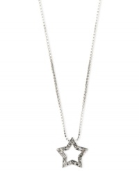 Shine bright in this festive star pendant by Anne Klein. Pave glass accents add allure to this ultra-glam style. Set in silver tone mixed metal. Approximate length: 16 inches + 2-inch extender. Approximate drop: 1/2 inch. Shine bright in this festive star pendant by Anne Klein. Pave glass accents add allure to this ultra-glam style. Set in silver tone mixed metal. Approximate length: 16 inches + 2-inch extender. Approximate drop: 1/2 inch.