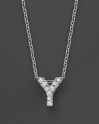 From the Tiny Treasures collection, a diamond Y necklace. With signature ruby accent. Designed by Roberto Coin. From the Tiny Treasures collection, a diamond Y necklace. With signature ruby accent. Designed by Roberto Coin.