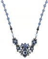 Baby blue hues, girly glamour. Flaunt your femininity with this dazzling necklace by 2028 featuring a floral pendant of blue crystals suspended from a chain decked out in midnight blue accent beads. Crafted in mixed metal. Approximate length: 16 inches + 3-inch extender. Approximate drop: 1 inch.