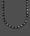 Transport yourself to the clear waters of Tahiti. Belle de Mer's sleek strand of black cultured Tahitian pearls (9-11 mm) adds a hint of exotic elegance to your ensemble. Clasp crafted in 14k white gold. Approximate length: 18 inches.