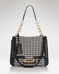 Check off trend-right accessorizing with this DIANE von FURSTENBERG shoulder bag, which strikes a cool contrast of texture and tonal leather. Check off trend-right accessorizing with this DIANE von FURSTENBERG shoulder bag, which strikes a cool contrast of texture and tonal leather.