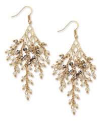 Drops of elegance. These sparkling earrings from c.A.K.e by Ali Khan are crafted from gold tone mixed metal and feature faceted glass rondelles. Approximate drop: 3 inches. Drops of elegance. These sparkling earrings from c.A.K.e by Ali Khan are crafted from gold tone mixed metal and feature faceted glass rondelles. Approximate drop: 3 inches.