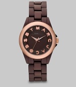 A ultra-lightweight design with a playful logo accented dial. Quartz movementWater resistant to 5 ATMRound brown aluminum case, 36mm (1.4)Smooth rose goldtone ion-plated bezelBrown dialLogo hour markersSecond hand Brown aluminum bracelet, 18mm wide (0.7)Imported