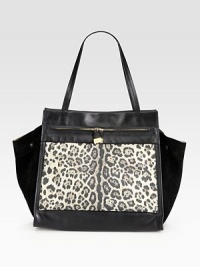 An angled shape rendered in leopard-print leather mixed with buttery suede. Double leather top handles, 9 dropMagnetic snap closureOne outside zip pocketOne inside zip pocket14W X 13H X 7DImported An angled shape rendered in leopard-print leather mixed with buttery suede. Double leather top handles, 9 dropMagnetic snap closureOne outside zip pocketOne inside zip pocket14W X 13H X 7DImported