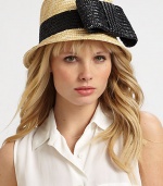 This sweet design showcases a large, whimsical bow. StrawBrim, about 2Cotton linedClean with damp clothMade in Italy 