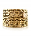Express yourself with fabulous style. This bold, statement-making cuff by Jessica Simpson features a unique patterned surface crafted in antique gold tone mixed metal. Bracelet stretches to fit wrist. Approximate diameter: 2-1/4 inches.