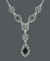 Old world glamour with modern flair. Genevieve & Grace's elegant y-shaped necklace features a filigree setting that highlights round and pear-cut onyx (3-8 mm) and sparkling marcasite. Crafted in sterling silver. Approximate length: 17 inches. Approximate drop: 1-1/2 inches.