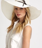 This chic, timeless style is finished with a braided faux-leather band.PaperBrim, about 6 wideMade in Italy of imported fabric