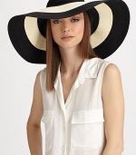 Graphic and glamorous, accented with a corded band.90% toyo paper/10% cottonCorded band with goldtone bolo endsBrim, about 6Hand washMade in USA of imported fabric
