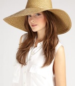 Stand out in this chic, woven sun hat that is lightweight, flexible and great for travel. PackableMetal logo rivet on backBrim, about 7Polypropylene/rayon/polyesterSpot cleanImported