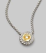 From the Color Classic Collection. A swirled sterling silver cookie pendant, with a faceted center of glowing citrine, on a bold box chain. Citrine Sterling silver Chain length, about 16 Pendant diameter, about ½ Lobster clasp Imported