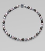 A beautiful multi-color piece with a mabe clasp closure. 8mm organic man-made round grey, nuage and Tahitian pearlsLength, about 18Mabe clasp closure Imported 
