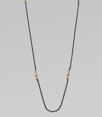 A simply chic design with 14k gold beads clusters on oxidized sterling silver link chain. 14k gold beadsOxidized sterling silverLength, about 40Spring ring closureMade in USA 