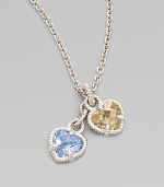 Two sweet faceted hearts, one of blue quartz, the other of canary crystal, are set in textured sterling silver and linked together on a sterling chain. Blue quartz and canary crystal Sterling silver Chain length, about 17 Pendant width, about ½ each Lobster clasp Imported Please note: Stone color may vary.