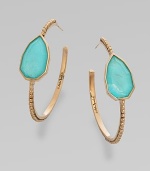 From the Trujillo Collection. A slender beaded hoop is richly punctuated by a faceted, teardrop-shaped doublet combining turquoise with a layer of rock crystal for a softer tone.Turquoise and rock crystalBronzeDiameter, about 1½Post backMade in USA