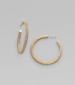 EXCLUSIVELY AT SAKS. Feminine filigree hoops, with dazzling pavé-set crystals. Crystal 18k goldplated Diameter, about 1½ Post back Imported