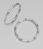 From the Bamboo Collection. A sterling silver hoop in a classic bamboo design.Sterling silver Diameter, about 1¼ Post backs Made in Bali 