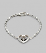 From the Love Britt Collection. Signature interlocking G in an iconic heart shape accents the wrist beautifully. Sterling silver Width of heart, about ¾ Length, about 6½ Lobster clasp closure Made in Italy 