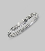 Substantial sterling links are accented with a clasp of delicate pavé diamonds. Diamond, 0.17 tcw Sterling silver 7½ long Spring lock closure Made in Bali