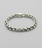 A handsome addition, crafted in polished box chain silver. 8½ long Imported