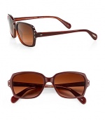 A feminine classic with an updated twist in chic acetate. Available in black with grey gradient polar lens, paldeo/moonstone with brown gradient polar lens or rouge with copper gradient lens. Flush pin details100% UV protectionImported 