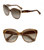 A classic shape with a full rimmed design in lightweight acetate. Available in honey/transparent with brown gradient lens or havana beige/opal with brown gradient lens. Logo temples100% UV protectionMade in Italy 