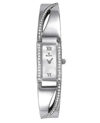 Pure eloquence with a Mother of Pearl dial with stunning crystal accents. Stainless steel silvertone case and bangle. Water resistant to 30 meters. Three-year limited warranty. Pure eloquence with a Mother of Pearl dial with stunning crystal accents. Stainless steel silvertone case and bangle. Water resistant to 30 meters. Three-year limited warranty.