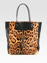 Luxurious animal printed haircalf accented with supple leather in a roomy top handle design.Double leather top handles, 8 dropOpen topProtective metal feetOne inside zip pocketTwo inside open pocketsFully lined12½W X 13H X 4½DImported Luxurious animal printed haircalf accented with supple leather in a roomy top handle design.Double leather top handles, 8 dropOpen topProtective metal feetOne inside zip pocketTwo inside open pocketsFully lined12½W X 13H X 4½DImported