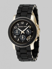 A new take on a traditional design, this gold IP stainless steel bracelet is wrapped in contrast polyurethane. Chronograph movement Water resistant to 100 meters Round case, 38mm Black glossy dial with Arabic numerals and stick indexes Date display between 4 and 5 o'clock Second hand Stainless steel link bracelet wrapped in polyurethane Bracelet width, about 20mm, .79 Imported A new take on a traditional design, this gold IP stainless steel bracelet is wrapped in contrast polyurethane. Chronograph movement Water resistant to 100 meters Round case, 38mm Black glossy dial with Arabic numerals and stick indexes Date display between 4 and 5 o'clock Second hand Stainless steel link bracelet wrapped in polyurethane Bracelet width, about 20mm, .79 Imported