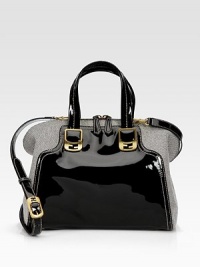 Shiny patent leather combines with ultra-luxe canvas in this tailored silhouette. Patent leather top handles, 5 dropAdjustable detachable patent leather shoulder strap, 18-24½ dropTop zip closureProtective metal feetTwo inside open pocketsFully lined12W X 10H X 6DMade in Italy Shiny patent leather combines with ultra-luxe canvas in this tailored silhouette. Patent leather top handles, 5 dropAdjustable detachable patent leather shoulder strap, 18-24½ dropTop zip closureProtective metal feetTwo inside open pocketsFully lined12W X 10H X 6DMade in Italy