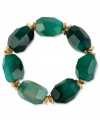 Look gorgeous in green. Robert Lee Morris' stretch bracelet is crafted from gold-tone mixed metal with semi-precious faceted green stones providing a fashion infusion. Approximate length: 7-1/2 inches.