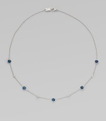 From the Silver Rain Collection. A simply chic style with rich London blue topaz and dazzling diamonds on a delicate sterling silver link chain. London blue topazDiamonds, .2 tcwSterling silverLength, about 18Lobster clasp closureImported 