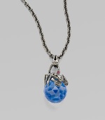 A darkened sterling silver creature, punctuated with pavé swarovski crystals, perches atop a vibrant sapphire crystal, suspended from a long delicate chain.Sapphire Swarovski crystal Black rhodium plated sterling silver Pendant, about 1½ Chain length, about 30 Lobster clasp Imported