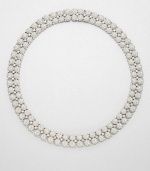 EXCLUSIVELY AT SAKS. Two rows of sparkling, crystal accented circles for a stunningly elegant piece. CrystalsRhodium-plated brassLength, about 16Box and tongue closureImported 