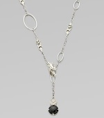 From the Naga Collection. Clasp the dragon head wherever you wish along this graceful open sautoir chain with a delicate drop of white sapphires and black chalcedony.White sapphireBlack chalcedonySterling silverLength, about 45Imported