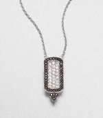 From the Soho Collection. This simply chic features white sapphires and black spinels on a sterling silver link chain. White sapphiresBlack spinelSterling silverLength, about 16Pendant size, about .9Lobster clasp closureImported 