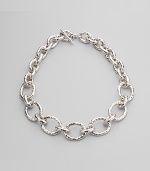 Chunky graduated links of hammered sterling silver make a bold and beautiful statement. Sterling silver Length, about 20 Toggle closure Imported