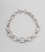 Chunky graduated links of hammered sterling silver make a bold and beautiful statement. Sterling silver Length, about 20 Toggle closure Imported
