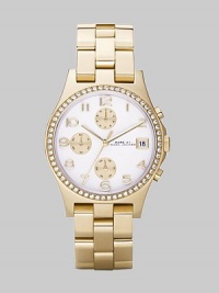 A classic chronograph dial with goldplated stainless steel bracelet and crystal bezel.Quartz movement Water resistant to 3 ATM Crystal bezel White chronograph dial Arabic numeral hour markers Date display at 3 o'clock Second hand Goldplated stainless steel link bracelet, 18mm, (.71) Imported A classic chronograph dial with goldplated stainless steel bracelet and crystal bezel.Quartz movement Water resistant to 3 ATM Crystal bezel White chronograph dial Arabic numeral hour markers Date display at 3 o'clock Second hand Goldplated stainless steel link bracelet, 18mm, (.71) Imported