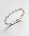 Three cushion-cut pink crystal stones set in textured sterling silver. Pink crystalSterling silverDiameter, about 2.3Hinged, push clasp closureImported 