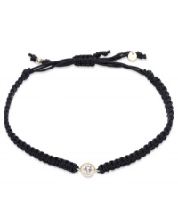 The perfect hint of sparkle. This trendy wrap bracelet features a round-cut cubic zirconia accent with a 14k gold bezel setting and accents. Cord crafted from braided black nylon. Approximate diameter: 2-1/4 inches (extends to 3-1/2 inches). The perfect hint of sparkle. This trendy wrap bracelet features a round-cut cubic zirconia accent with a 14k gold bezel setting and accents. Cord crafted from braided black nylon. Approximate diameter: 2-1/4 inches (extends to 3-1/2 inches).