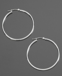 These delicate hoop earrings are the perfect compliment to your dressed-up style or everyday look. Crafted in 14k white gold. Approximate diameter: 3/8 inch.