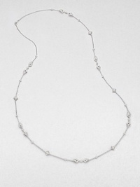 The perfect piece for doubling, this delicate design features stations of different shapes accented in pavé crystals. CrystalsRhodium-plated brassLength, about 36Lobster clasp closureImported The perfect piece for doubling, this delicate design features stations of different shapes accented in pavé crystals. CrystalsRhodium-plated brassLength, about 36Lobster clasp closureImported